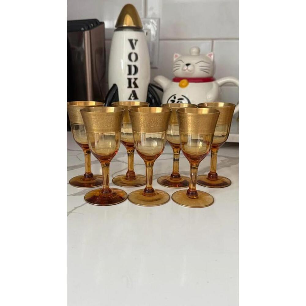 VINTAGE amber cordial glasses with gold trim and a Greek key design.